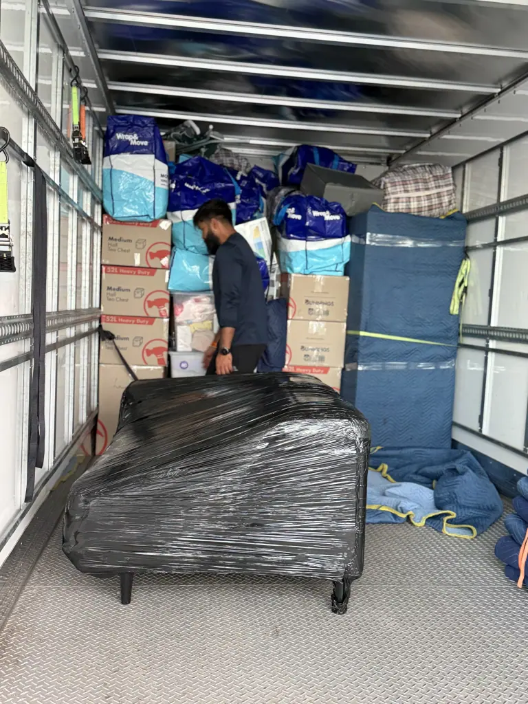 Removalist crew loading a truck on moving day