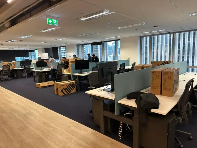 Office desks and equipment ready for relocation